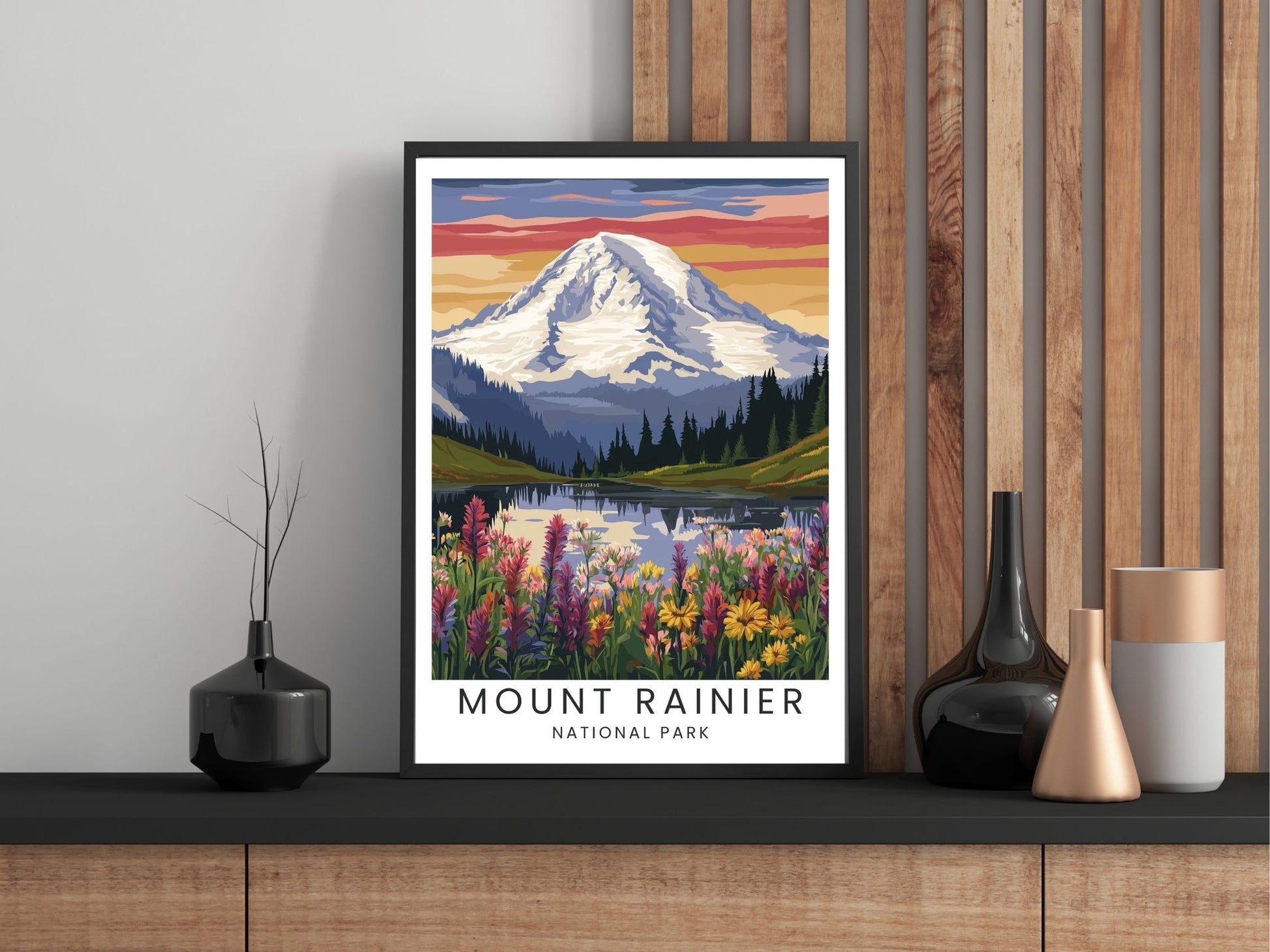Framed poster of Mount Rainier National Park on a wall with decorative vases.